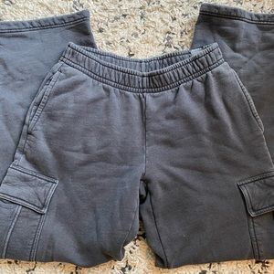 TNA Cozy mega cargo sweatpants in dark grey/black